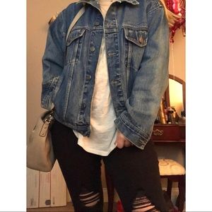 Oversized 80s style distressed denim/jean jacket